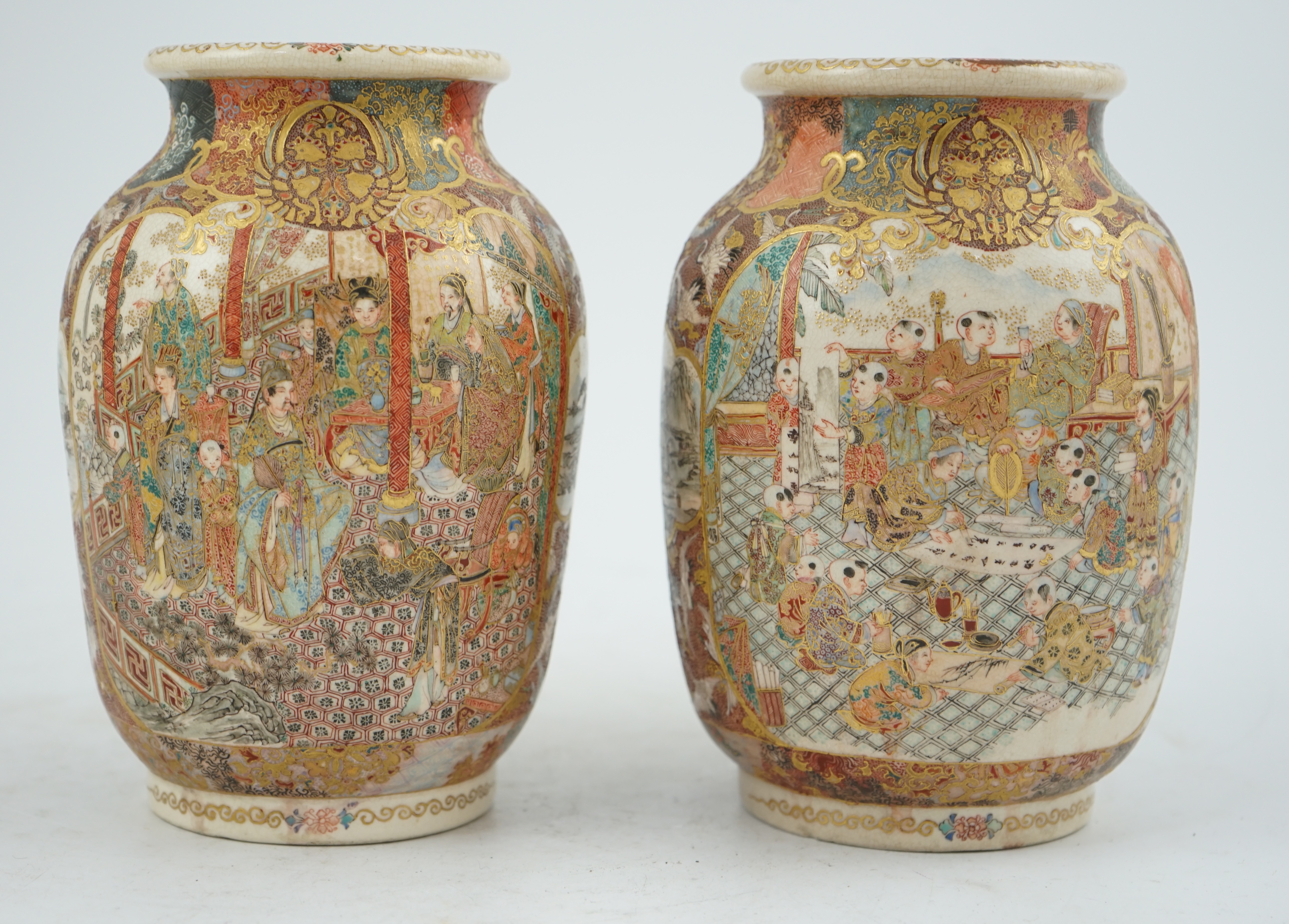 A pair of Japanese Satsuma 'boys' ovoid vases, Meiji period